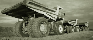 Large Dump Truck With Huge Wheels and Axles Large View