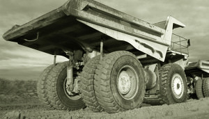 Large Dump Truck With Huge Wheels and Axles